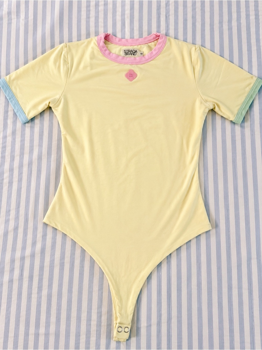 Yellow Bodysuit with Pink Neckline